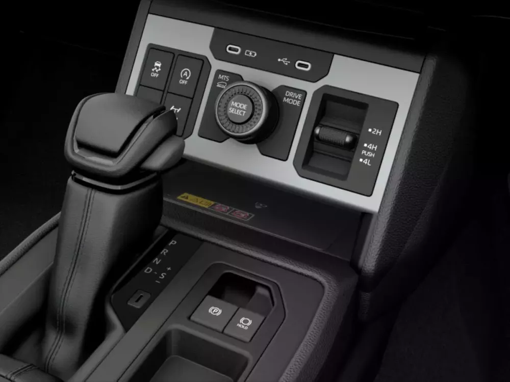 Cụm nút bấm và núm xoay bên dưới màn hình của Toyota Hilux 2026